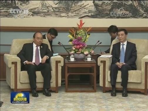 王沪宁会见越南总理
