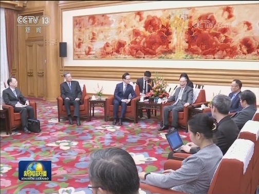 王岐山会见日本国家安全保障局长