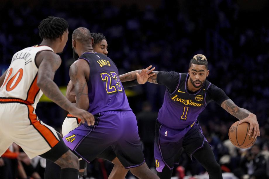 詹姆斯28+11+11失绝平球 湖人憾负活塞