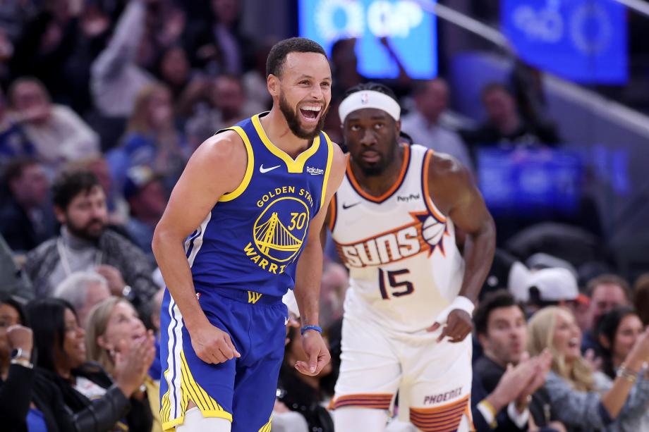 库里28分布克空砍38分 勇士拒逆转主场轻取太阳