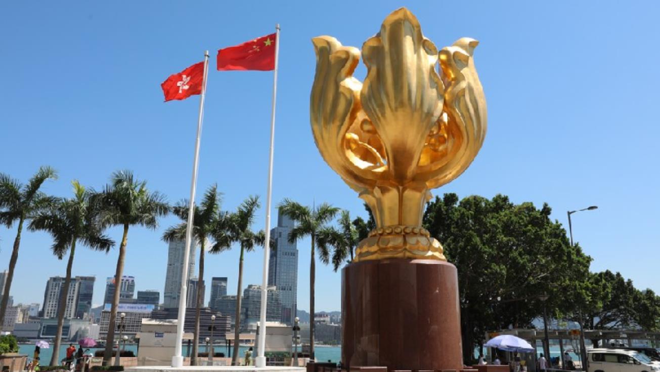 China’s national flag and the flag of the HKSAR on Golden Bauhinia Square in Hong Kong, south China. /Xinhua