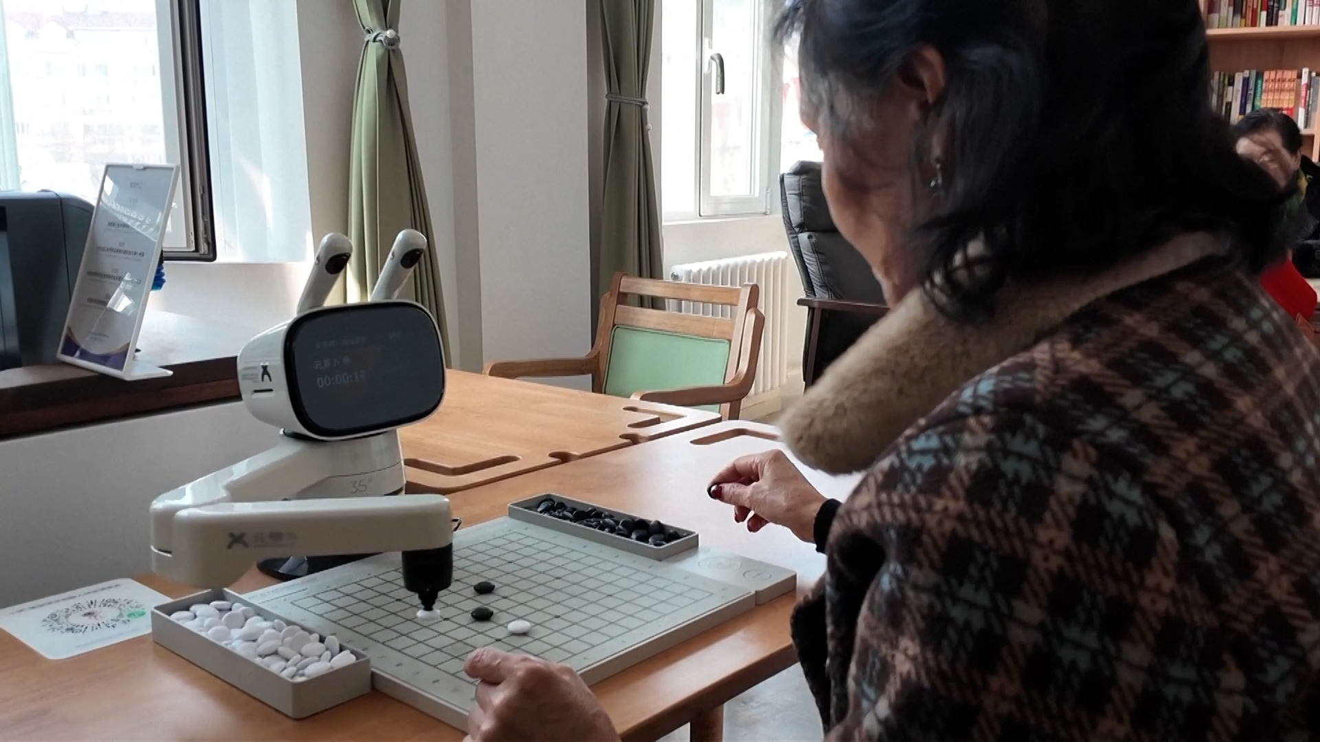 Robot-empowered elderly care station launched in Beijing