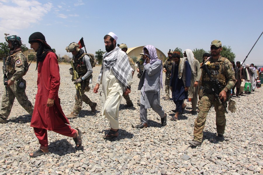 Photo taken in Kunduz city, Afghanistan on May 26, 2021 shows people who were rescued by Afghan Special Forces from a Taliban detention center located in neighboring Baghlan province.