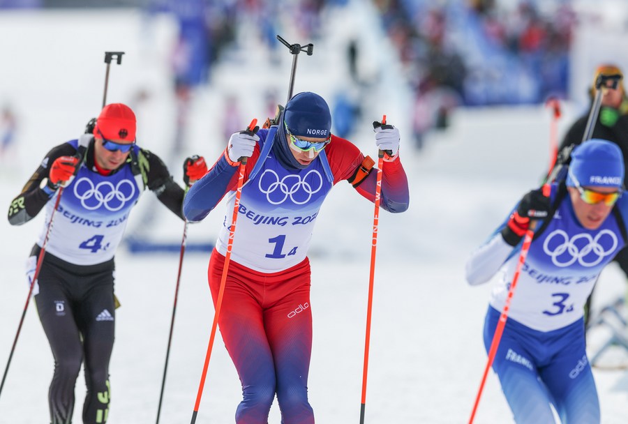 Vetle Sjaastad Christiansen (C) of Norway competes during biathlon men’s 4x7.5km relay at Natio<em></em>nal Biathlon Center in Zhangjiakou, north China’s Hebei Province, Feb. 15, 2022. (Xinhua/Ding Ting)