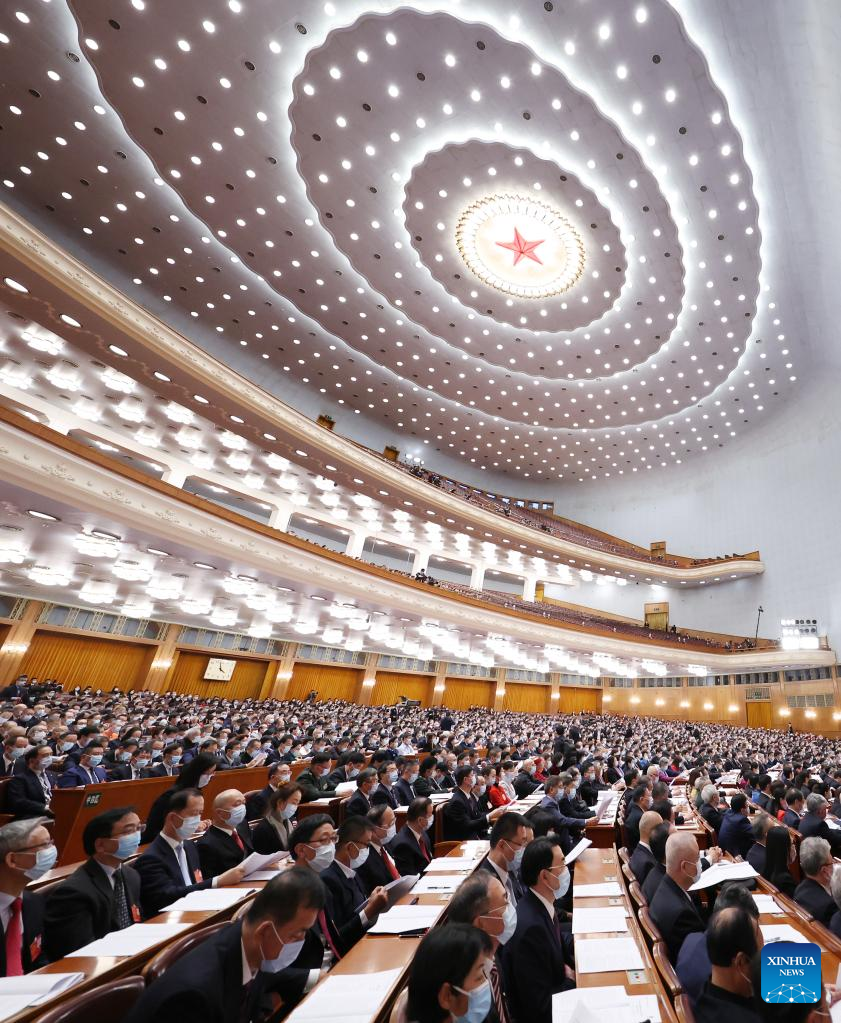 Members of the 13th National Committee of the Chinese People’s Political Consultative Conference (CPPCC) attend the opening meeting of the fifth session of the 13th CPPCC National Committee at the Great Hall of the People in Beijing, capital of China, March 4, 2022. (Xinhua/Yin Gang)