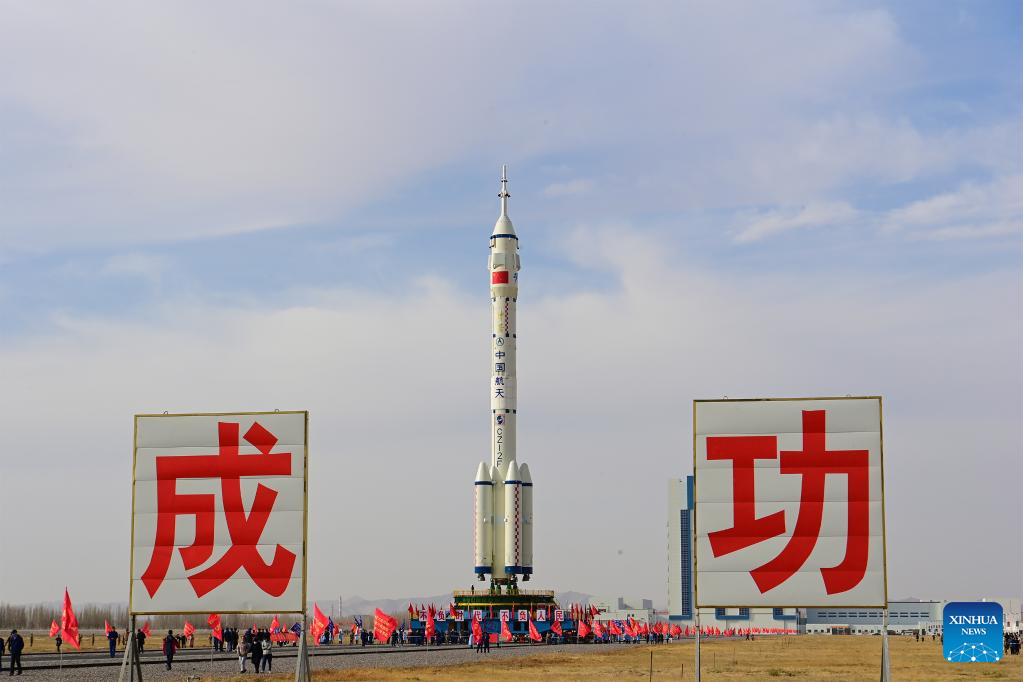 The combination of the Shenzhou-15 crewed spaceship and a Long March-2F carrier rocket is being transferred to the launching area in Jiuquan Satellite Launch Center in northwest China, Nov. 21, 2022. (Photo by Wang Jiangbo/Xinhua)