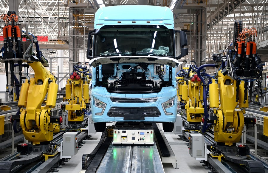 A heavy truck is assembled on the production line at a factory of the Shaanxi Automobile Holding Group in Xi
