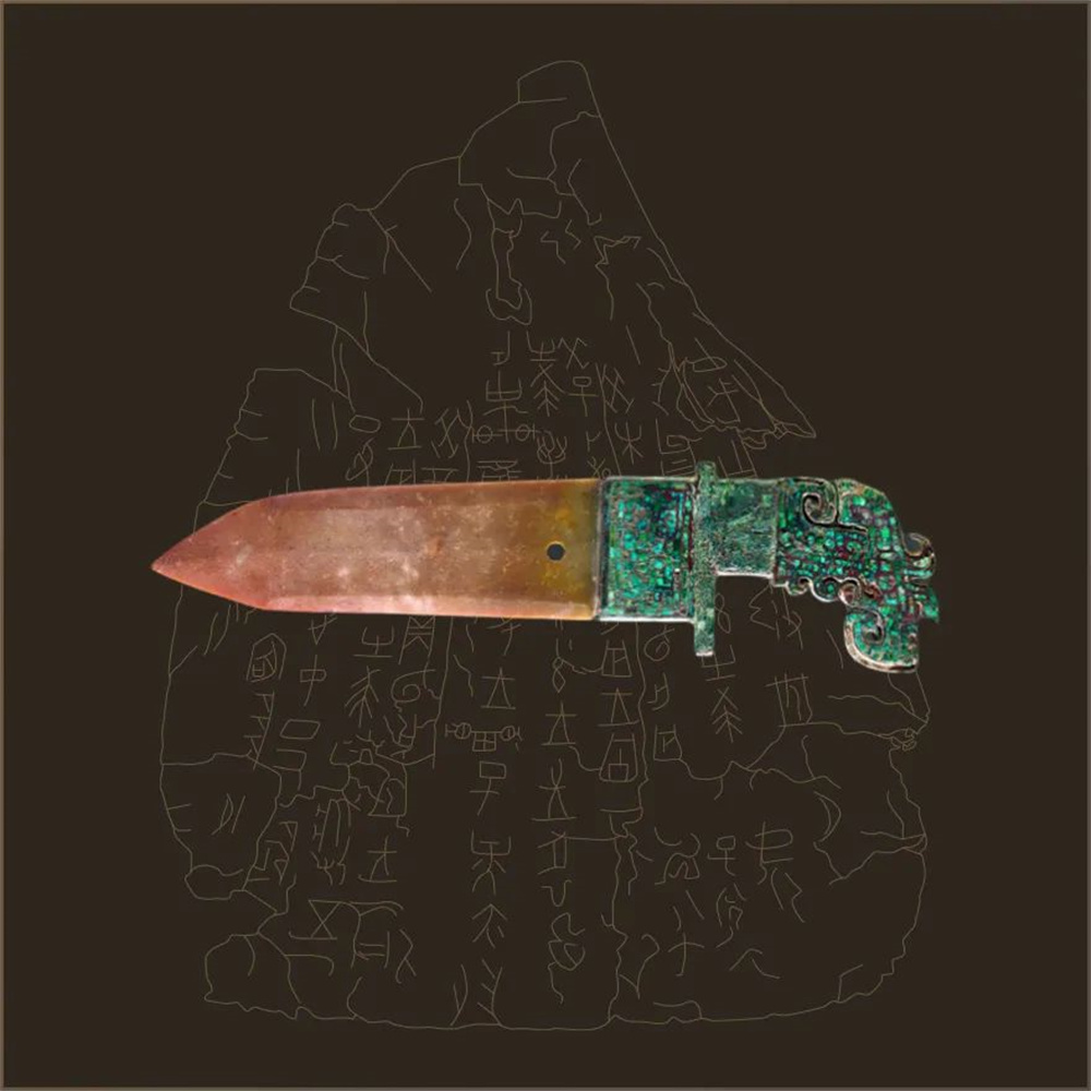 玉援铜内戈，通长27.8厘米，玉援长15.8厘米，国家博物馆藏