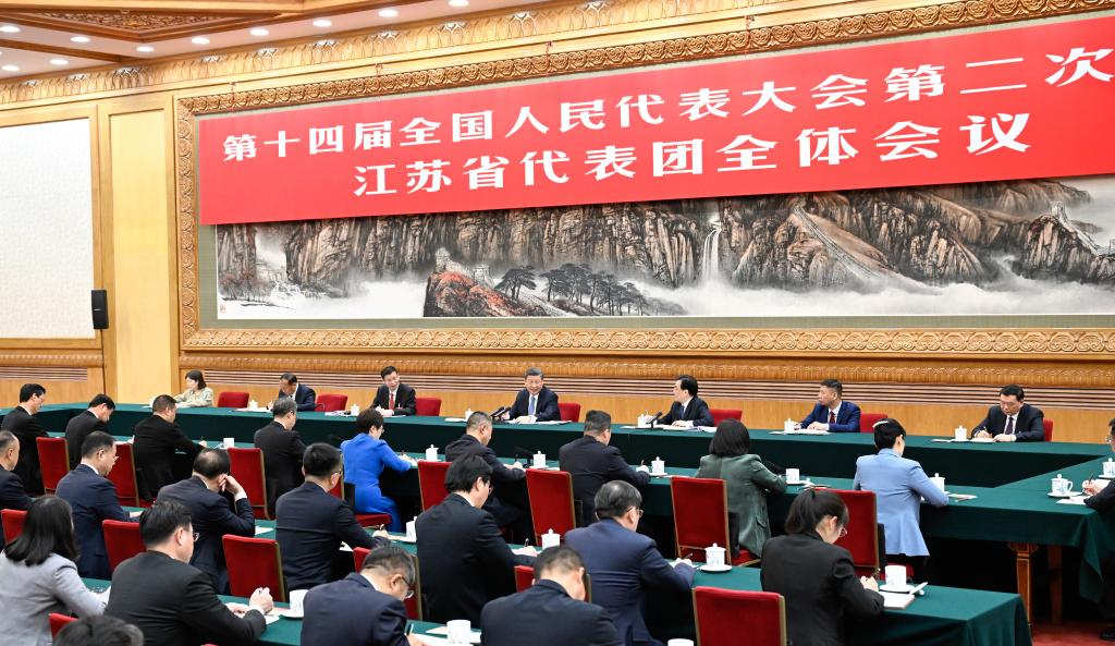 Chinese President Xi Jinping, also general secretary of the Communist Party of China Central Committee and chairman of the Central Military Commission, takes part in a deliberation with his fellow deputies from the delegation of Jiangsu Province at the second session of the 14th National People’s Congress (NPC) in Beijing, capital of China, March 5, 2024. (Xinhua/Xie Huanchi)