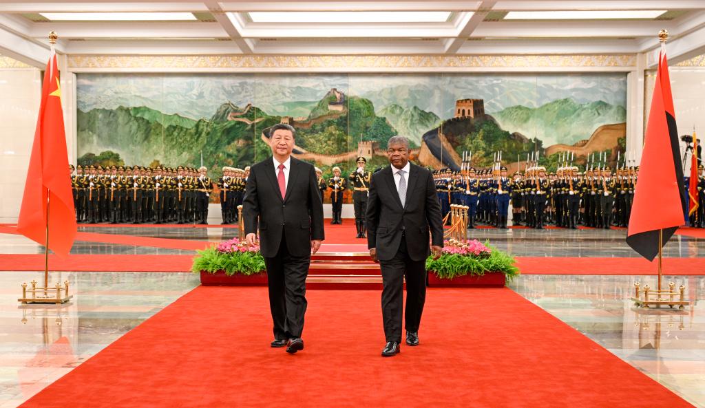 Chinese President Xi Jinping holds a welcome ceremony for President of the Republic of Angola Joao Lourenco in the Northern Hall of the Great Hall of the People prior to their talks in Beijing, capital of China, March 15, 2024. Xi held talks with Lourenco, who is on a state visit to China, in Beijing on Friday. (Xinhua/Li Xueren)