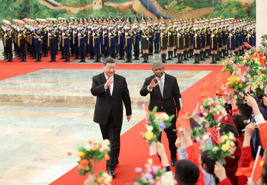 Chinese President Xi Jinping holds a welcome ceremony for President of the Republic of Angola Joao Lourenco in the Northern Hall of the Great Hall of the People prior to their talks in Beijing, capital of China, March 15, 2024. Xi held talks with Lourenco, who is on a state visit to China, in Beijing on Friday. (Xinhua/Ding Haitao)