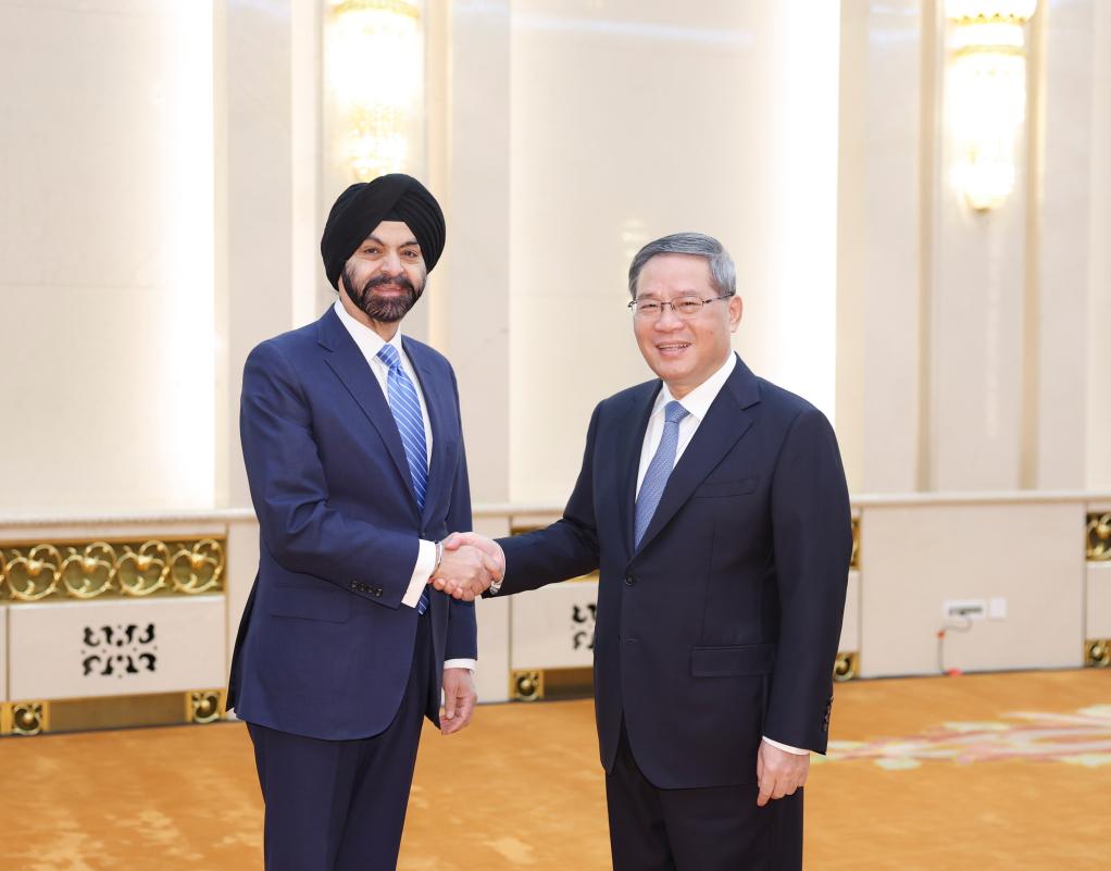 Chinese Premier Li Qiang meets with World Bank President Ajay Banga at the Great Hall of the People in Beijing, capital of China, March 25, 2024. (Xinhua/Ding Haitao)