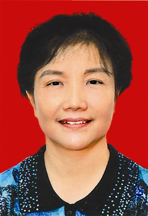 王穗明同志简历